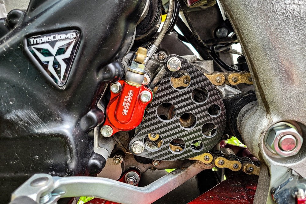 KIT COPRI PIGNONE CARBONIO TITAN AJP PR7 - ambro - racing